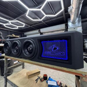 Custom RAM Truck Under-Seat Subwoofer Enclosure with Illuminated LED Logo Panel